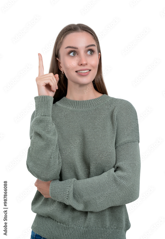 Woman pointing upwards with a thoughtful expression on her face, wearing a grey sweater. Isolated on a white background. Concept of having an idea or inspiration Woman pointing upwards with a thoughtful expression on her face, wearing a grey sweater. Isolated on a white background. Concept of having an idea or inspiration