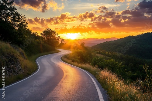 Wallpaper Mural Winding road through scenic mountains at sunset with colorful clouds Torontodigital.ca