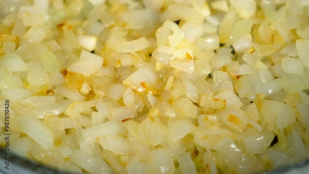 Cooking stirring chopped onions in frying pan to golden color on gas stove on kitchen. Culinary techniques, homemade preparing healthy meal, cook food dish, cuisine, seasoning garlic. Cooking stirring chopped onions in frying pan to golden color on gas stove on kitchen. Culinary techniques, homemade preparing healthy meal, cook food dish, cuisine, seasoning garlic.