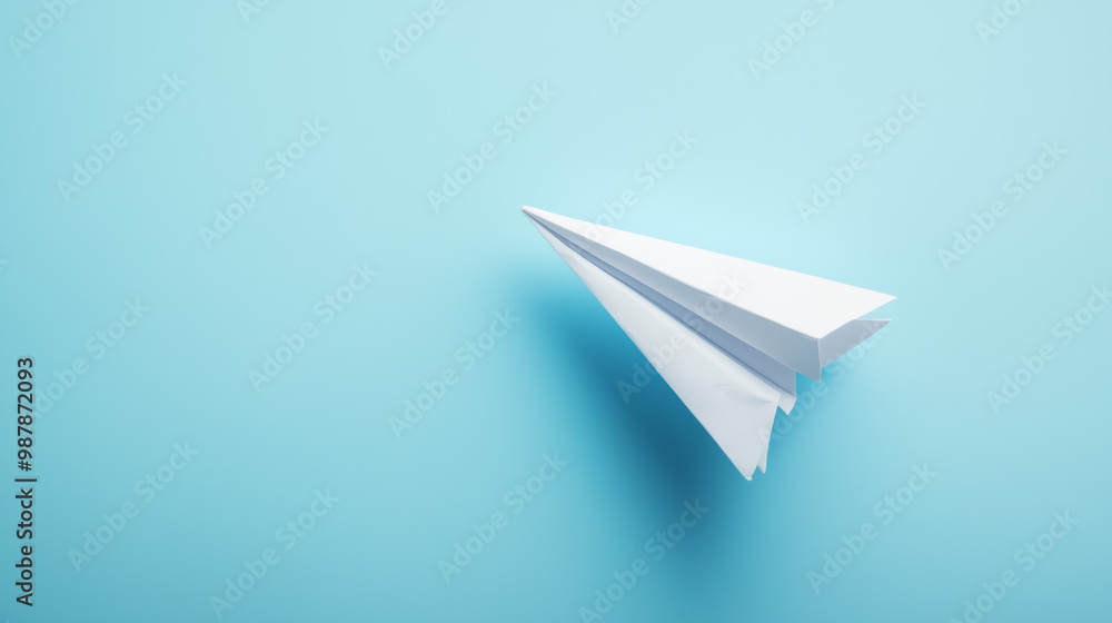 Paper Plane Flying Upward on a Light Sky-Blue Background Symbolizing Achievement and Aspirations with Ample Space for Text Paper Plane Flying Upward on a Light Sky-Blue Background Symbolizing Achievement and Aspirations with Ample Space for Text