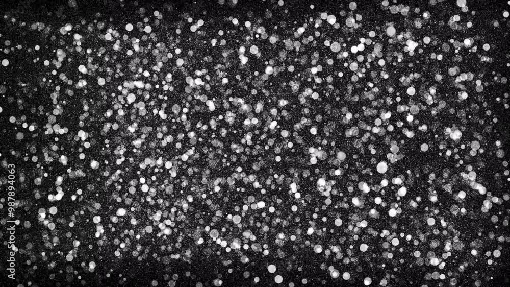 Monochrome bokeh moving transparent circles on black Monochrome bokeh moving transparent circles on black