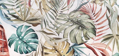Fotografi Texture of wallpaper or fabric with an ornament of colored palm leaves on a white background