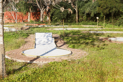 Curved ramp on a mini golf course photo