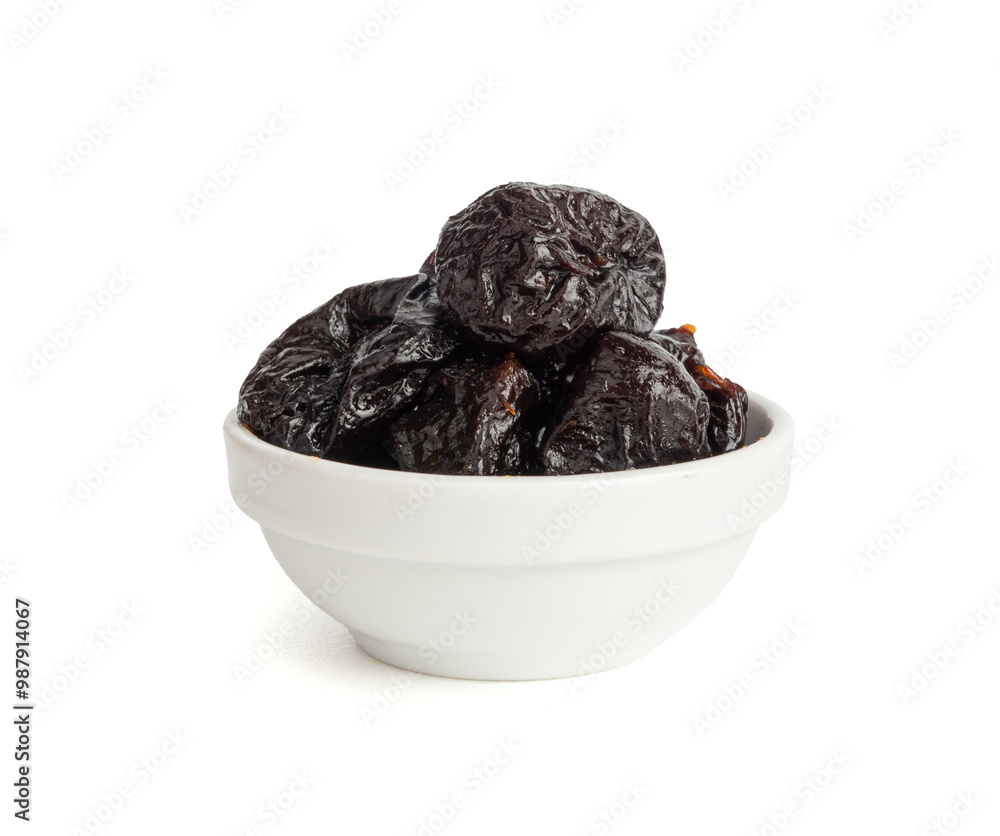 Dry Plums Isolated, Dried Black Fruits, Prune Group, Dry Plum Fruit on White Background Dry Plums Isolated, Dried Black Fruits, Prune Group, Dry Plum Fruit on White Background