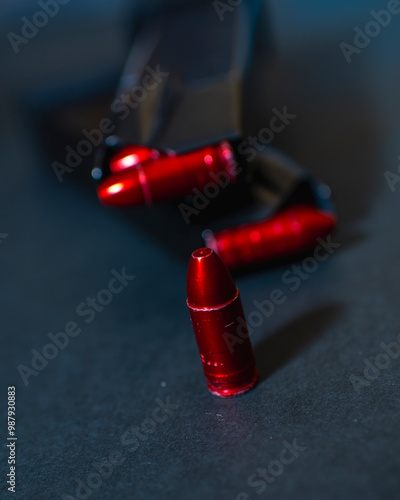 red 9mm bullets and magazines