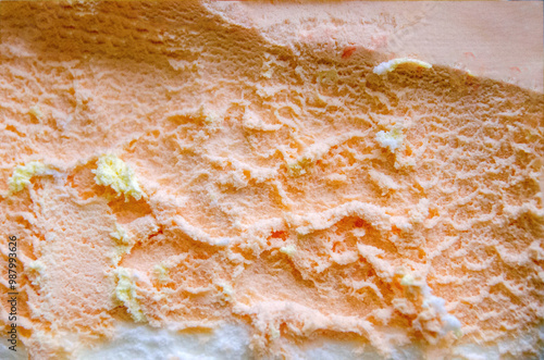 texture of yellow white and green ice cream like background, close up