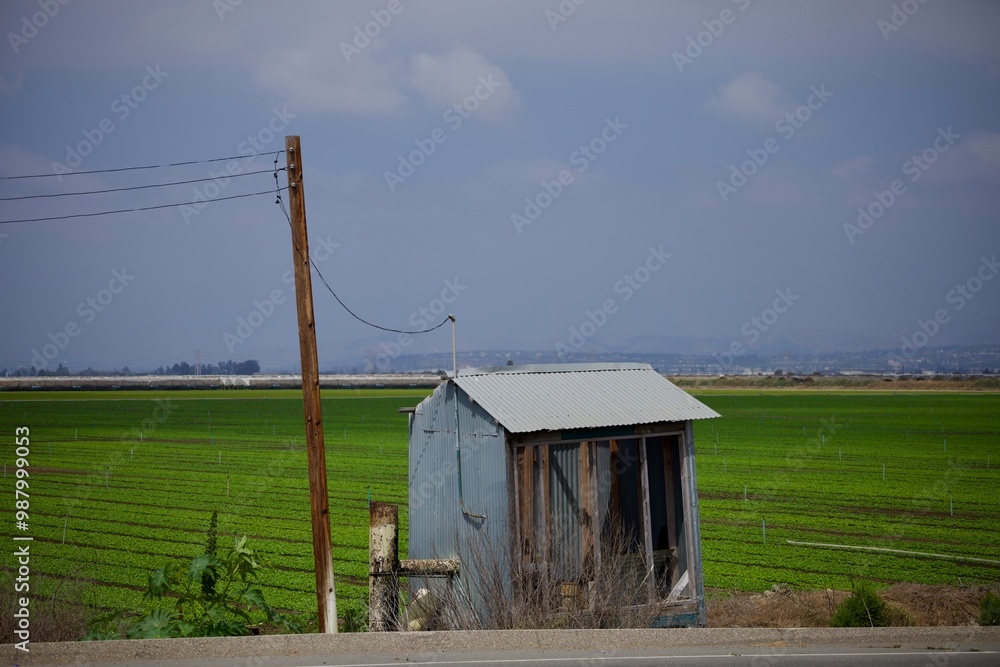 rustic corrugated metal shed out in the field rustic corrugated metal shed out in the field