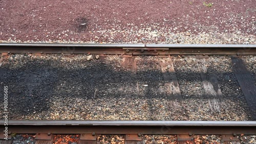 Railroad tracks going by in slow motion