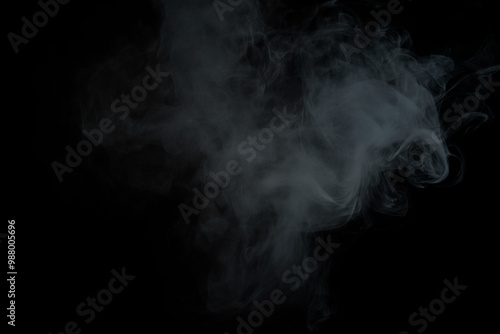 Smoke or fog over a black background