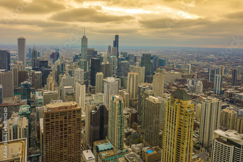 Golden Cityscape.
The sprawling beauty of a modern metropolis, basked in golden hues under a dramatic sky.