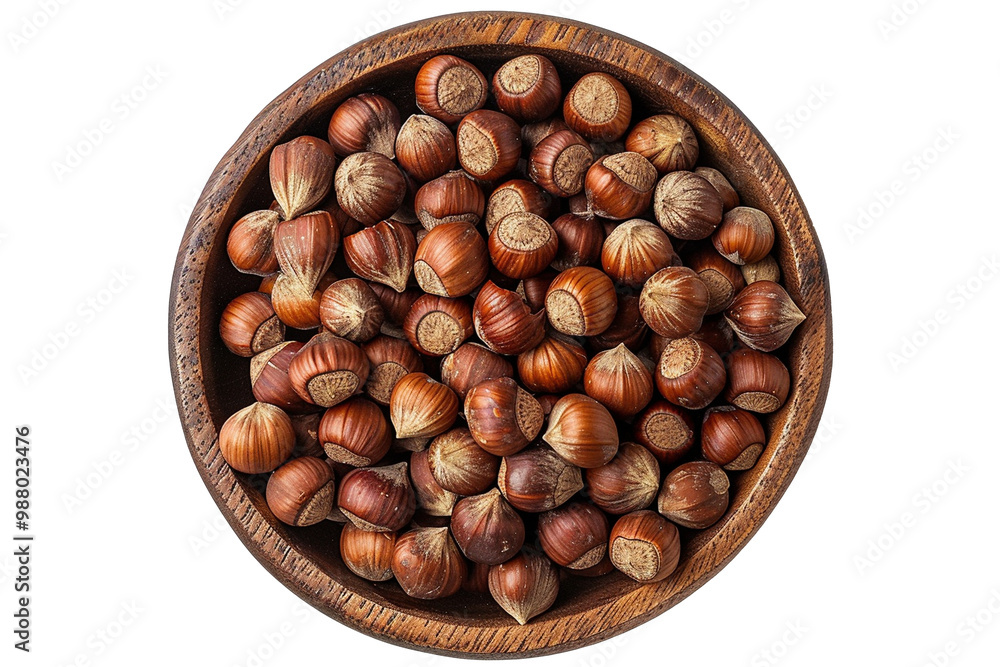 hazelnuts in a wooden bowl on white background hazelnuts in a wooden bowl on white background