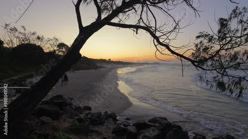 unset beach views across Main Beach in Byron Bay, New South Wales, Eastern Australia photo