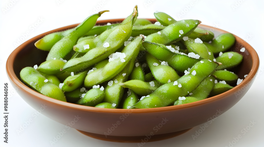 A simple bowl of steamed edamame beans sprinkled with sea salt A simple bowl of steamed edamame beans sprinkled with sea salt