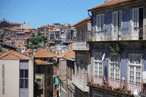 A captivating view of Porto’s historic city center, showcasing a mix of terracotta rooftops and charming architecture