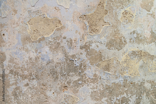 Close-up view of the wall paint peeling off and mold on the wall. photo