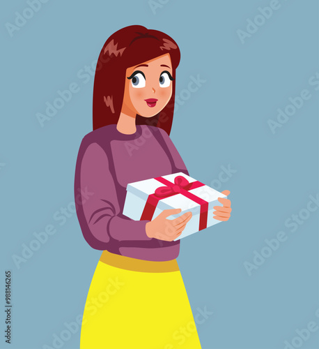 Smiling Woman Holding a Gift Box Vector Cartoon Illustration. Joyful festive lady celebrating with a present box 
