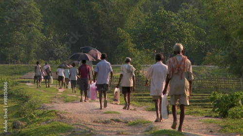 Group of people walking in rural India
