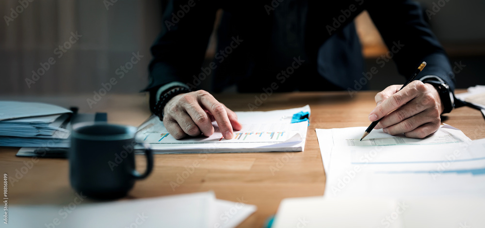 Businessman hand working on document or paperwork, standing at desk office. Businessman hand working on document or paperwork, standing at desk office.