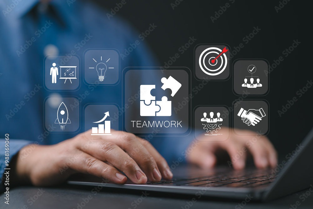 Teamwork and partnership concept. Businessman using laptop with teamwork icon on virtual screen. Team business, problem solving, team victory brainstorm, networking and group leader. Teamwork and partnership concept. Businessman using laptop with teamwork icon on virtual screen. Team business, problem solving, team victory brainstorm, networking and group leader.