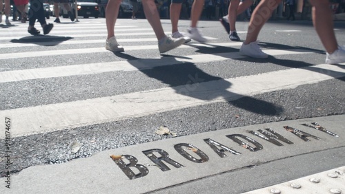 Photography Broadway street sign, people on pedestrian zebra crossroad