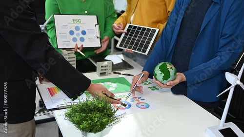 Wallpaper Mural business team people planning and discussing on recycle reduce reuse policy symbol in office meeting room. Green business company and Solar Energ Torontodigital.ca