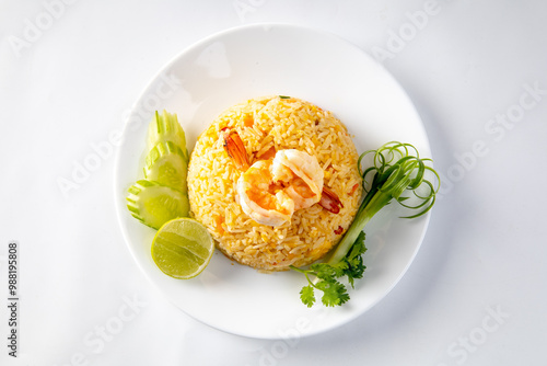 Shrimp fried ricei put in a white plate on a white background photo