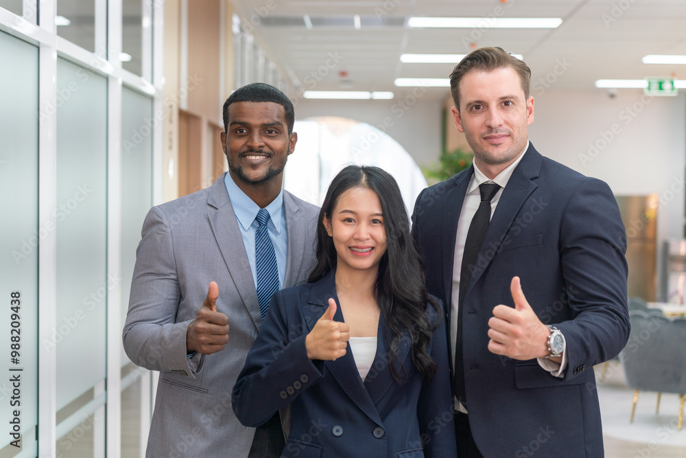 Multi-Ethnic Business People in Modern Office Setting Multi-Ethnic Business People in Modern Office Setting