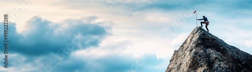 A determined climber stands triumphantly on a mountain peak, waving a flag against a dramatic sky, symbolizing victory and achievement. photo