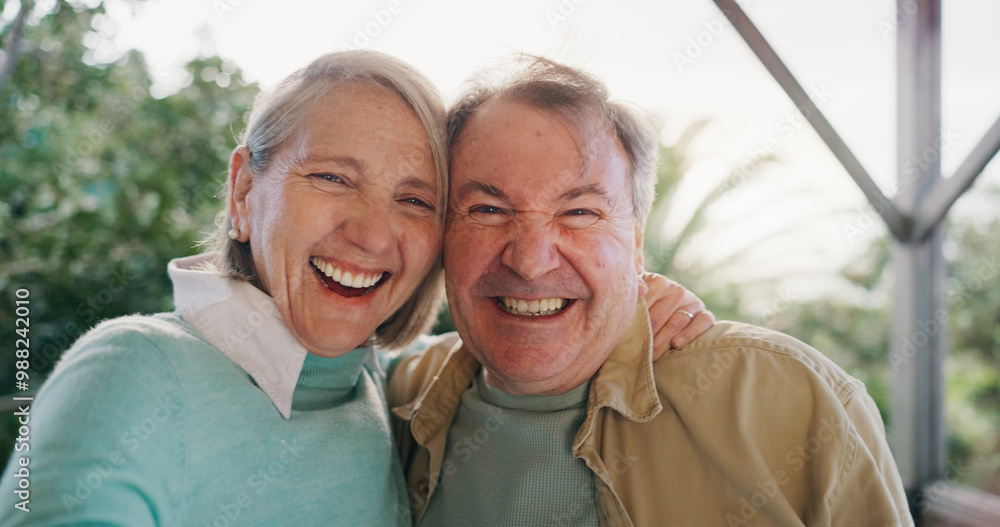 Fototapeta premium Senior couple, selfie and happy with hug, love and connection in portrait on patio in summer. Elderly man, woman and excited for memory, embrace and bonding with photography at house in Germany