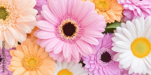 Gorgeous, vibrant, multicoloured still life detail of a mixed flower bouquet.