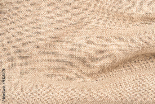 Jute hessian sackcloth woven burlap texture background in sepia cream old aged brown color photo