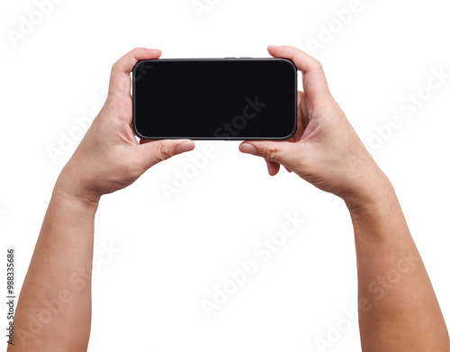 Hand is holding a smartphone in horizontal with a thumb touch on screen isolated in white background. Background cutout mobile phone with transparent screen for application mockup. photo