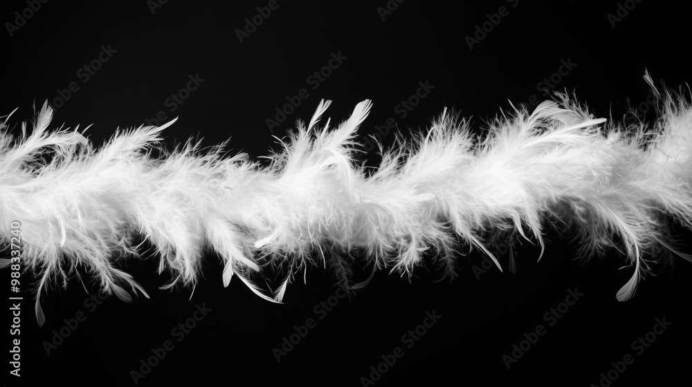 Fototapeta premium White feather boa isolated on black background, party isolated png like style.. Isolated on black background png like style. Created using Generative AI Technology 