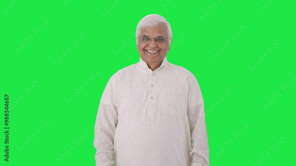 Happy Indian old man smiling at the camera Green screen Happy Indian old man smiling at the camera Green screen