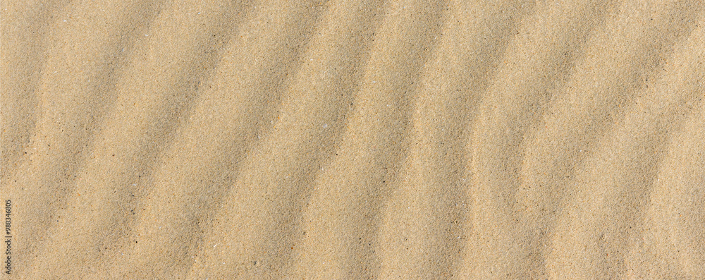 Sand texture. Sandy beach for background. Top view. Natural sand stone texture background. sand on the beach as background. Wavy sand background for summer designs. Sand texture. Sandy beach for background. Top view. Natural sand stone texture background. sand on the beach as background. Wavy sand background for summer designs.