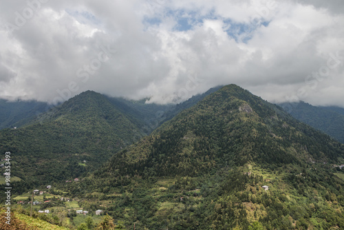 Village at the foot of the mountains in Georgia. Mountains in Georgia. Travel to Georgia.