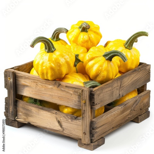 Pattypan squashes in wooden crate isolated, yellow shriveled pumpkins, decorative zucchini on white photo