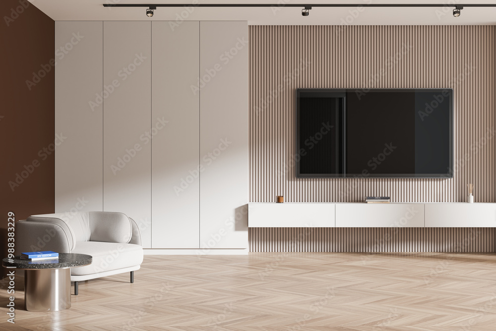 Fototapeta premium Stylish chill room interior with tv set and drawer, armchair on hardwood floor