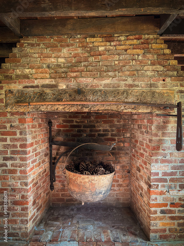 Cast iron cauldron and fireplace