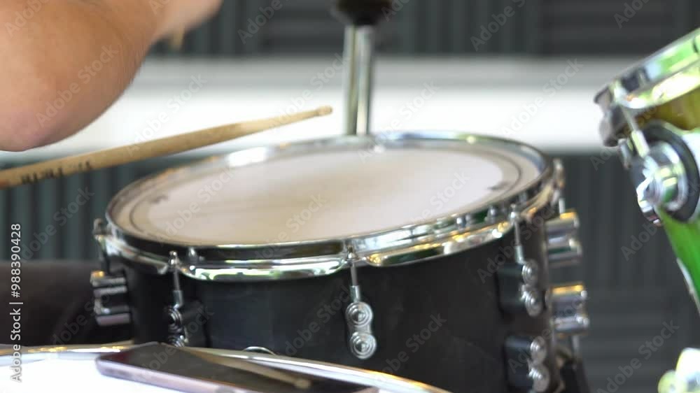 Drummer Playing Drums With A Wooden Stick. - closeup, slow motion shot Drummer Playing Drums With A Wooden Stick. - closeup, slow motion shot