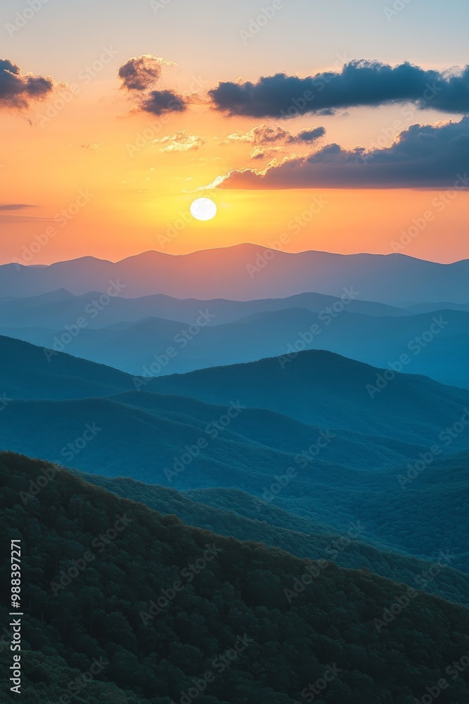 Stunning sunset over rolling mountain ranges in a serene landscape with distant peaks during twilight hours Stunning sunset over rolling mountain ranges in a serene landscape with distant peaks during twilight hours