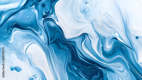 Fluid abstract background with marbled effect in blue and white