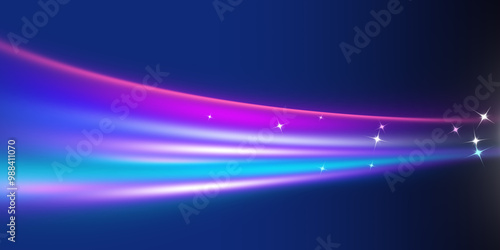 Colorful glowing light trails swirl with sparks on dark blue background. Neon colored curved light beams.