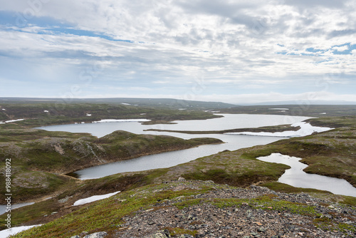 A lake in the highlands of the Varanger Peninsula on a mid summer day, Pettervannet, Vadsø, Finnmark photo