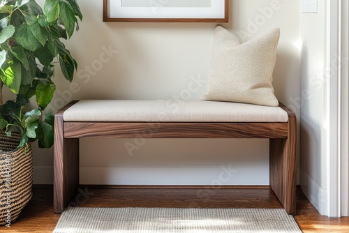 A cozy entryway seating area featuring a wooden bench and greenery