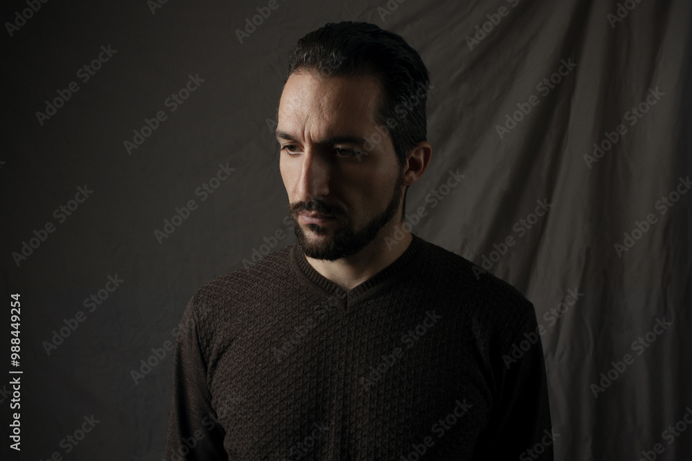 Fototapeta premium Male portrait on a gray background