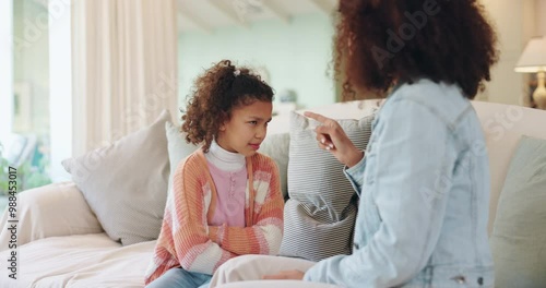 Listen, mother and discipline child in home to stop bad behavior, problem and learning strict rules. Mom, girl and scold for punishment with parent warning naughty kid for mistake, fail or conflict
