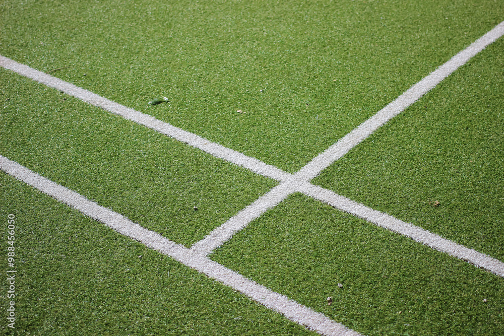 Obraz premium tennis court covered with artificial grass close up