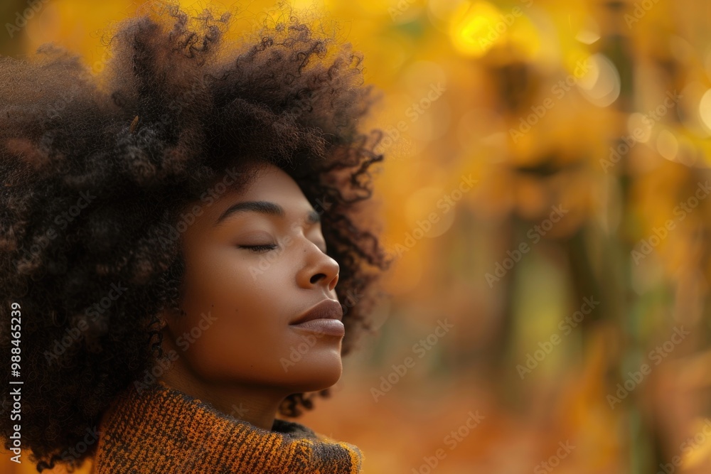 Black Woman In Fall. Young African Woman Relaxing in Autumn Forest Black Woman In Fall. Young African Woman Relaxing in Autumn Forest