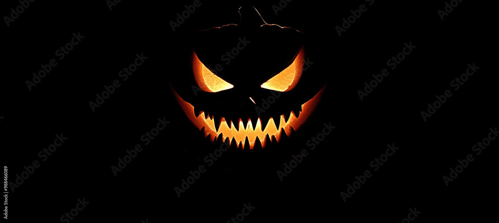 Fototapeta premium Glowing Jack-o'-Lantern with Fangs